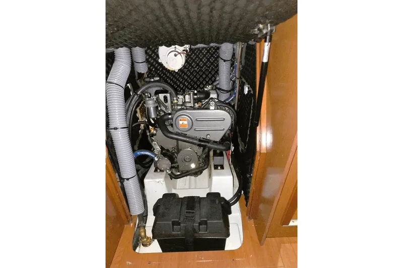  Yacht Photos Pics Engine compartment of a 2013 Beneteau Oceanis 37 sailboat, showcasing mechanical components.
