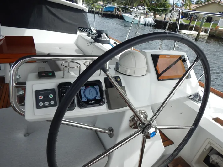  Yacht Photos Pics Beneteau Sense 55 yacht helm with navigation instruments, 2015 model.
