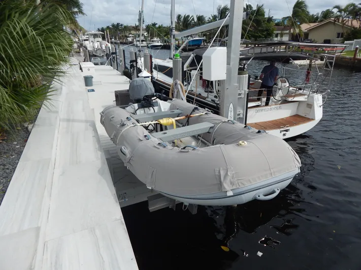  Yacht Photos Pics Beneteau Sense 55 yacht docked with inflatable dinghy, 2015 model.