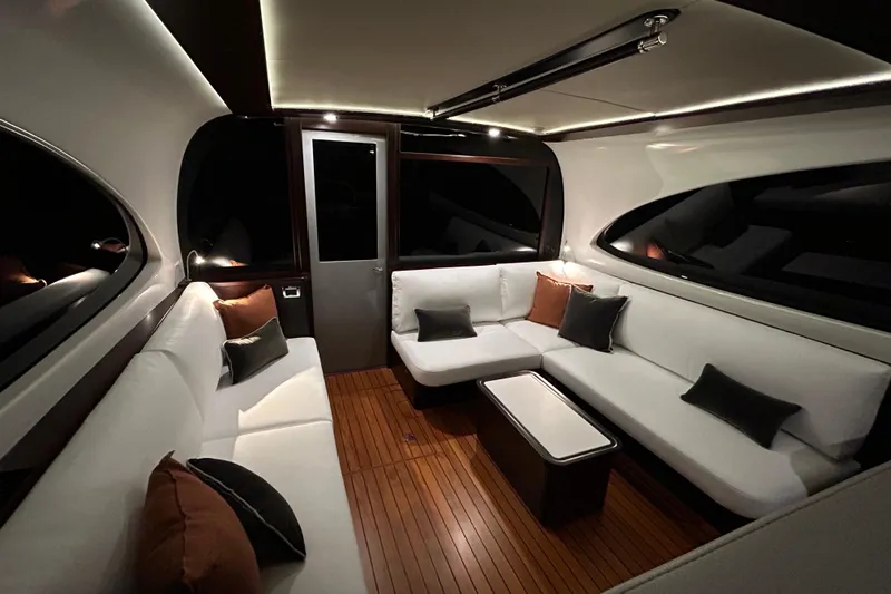 Gt60 Yacht Photos Pics Luxurious interior of 2021 Palm Beach Motor Yachts GT60 with elegant seating and ambient lighting.