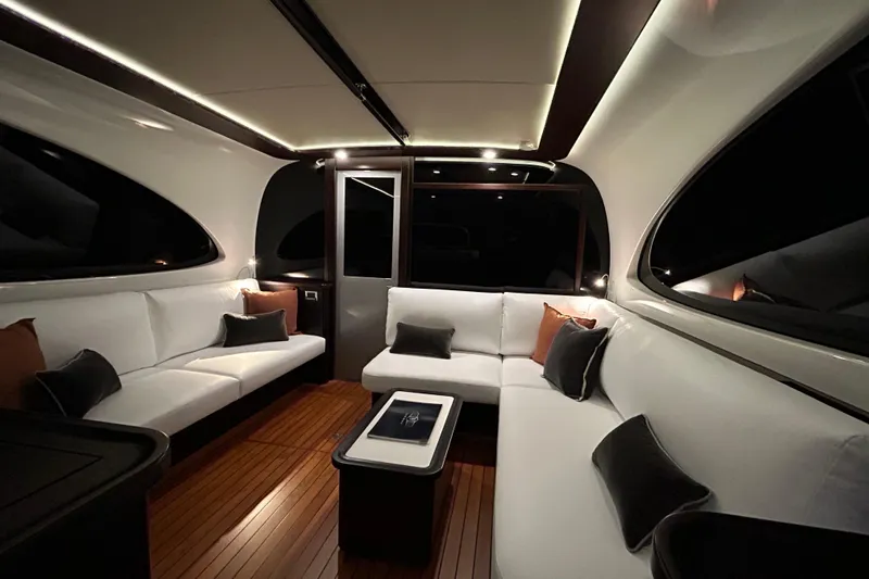 Gt60 Yacht Photos Pics Luxurious interior of 2021 Palm Beach Motor Yachts GT60 with elegant seating and ambient lighting.