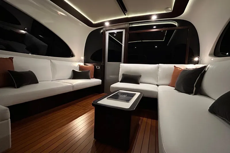 Gt60 Yacht Photos Pics Luxurious interior of 2021 Palm Beach Motor Yachts GT60 with elegant seating and modern design.