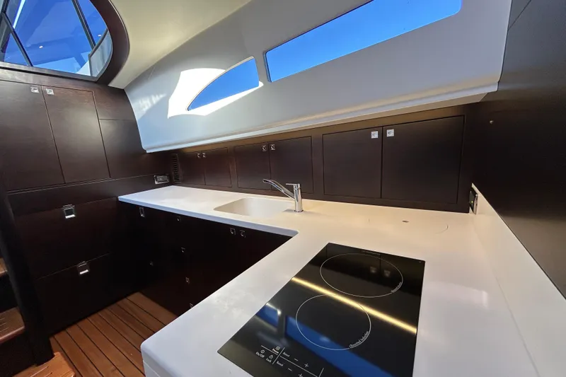 Gt60 Yacht Photos Pics Luxurious kitchen interior of 2021 Palm Beach Motor Yachts GT60 with modern appliances.