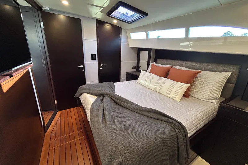 Gt60 Yacht Photos Pics Luxurious bedroom interior of 2021 Palm Beach Motor Yachts GT60 with modern design.