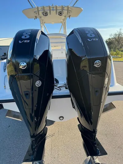 Yacht Photos Pics 2023 SeaVee 290B boat with dual V8 outboard engines, rear view.