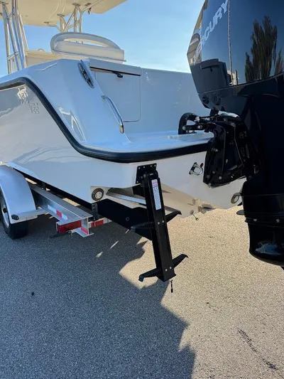  Yacht Photos Pics 2023 SeaVee 290B boat on trailer with Mercury outboard motor.