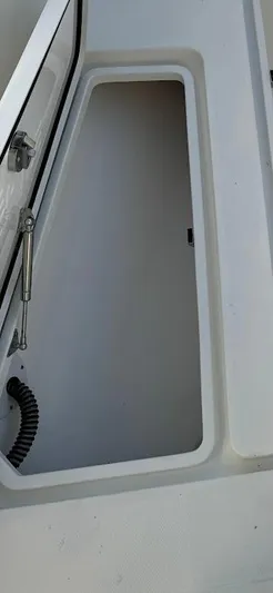  Yacht Photos Pics Open storage compartment on 2023 SeaVee 290B boat.