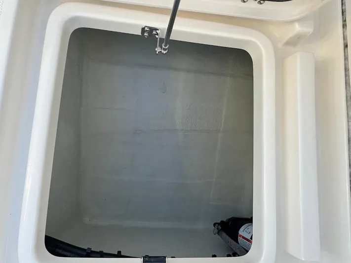  Yacht Photos Pics Storage compartment of 2023 SeaVee 290B boat, featuring a spacious interior.