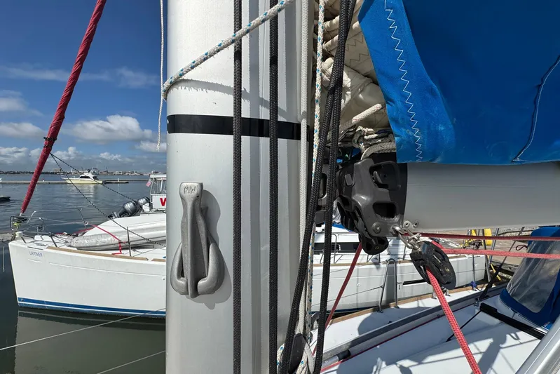 Sea Ranch II Yacht Photos Pics 2018 Jeanneau Sun Odyssey 389 sailboat mast and rigging in marina setting.