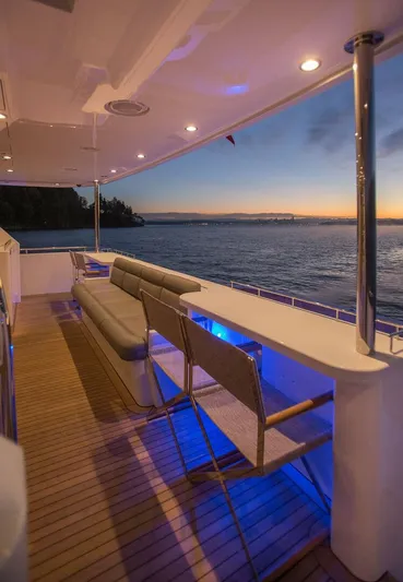 Cazador Yacht Photos Pics 2019 Nordlund Expedition Yachtfisher deck at sunset with ocean view