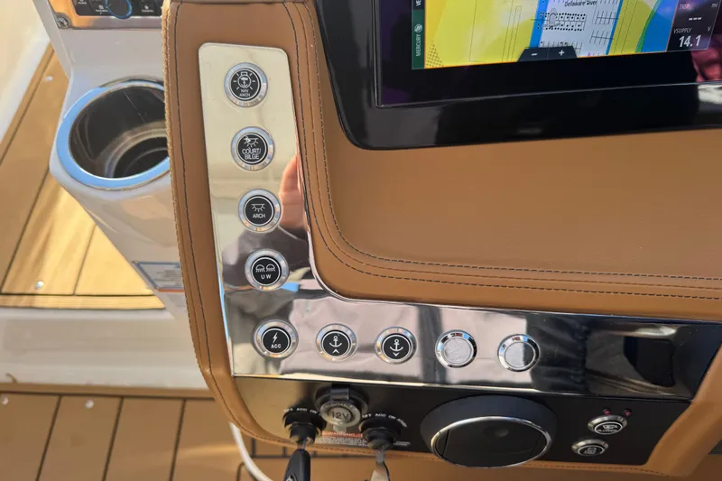  Yacht Photos Pics 2023 Chaparral 347 SSX boat dashboard with navigation controls and touchscreen display.