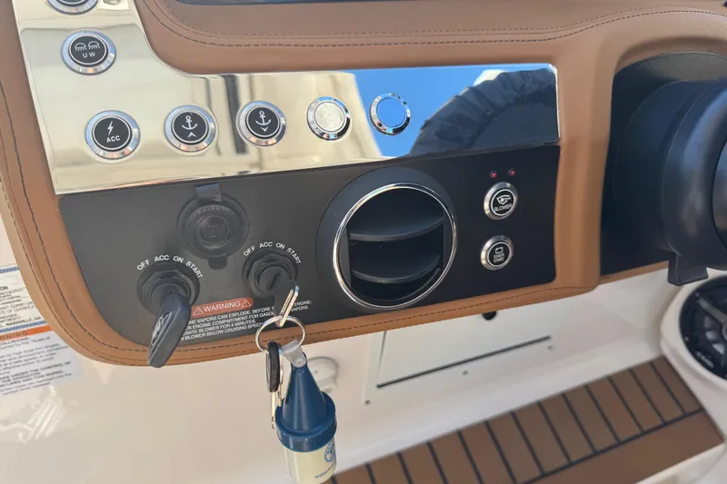  Yacht Photos Pics Dashboard of 2023 Chaparral 347 SSX boat with controls and ignition keys.