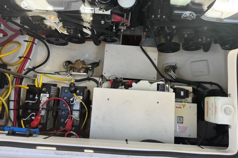  Yacht Photos Pics Engine compartment of 2023 Chaparral 347 SSX with visible batteries and wiring.
