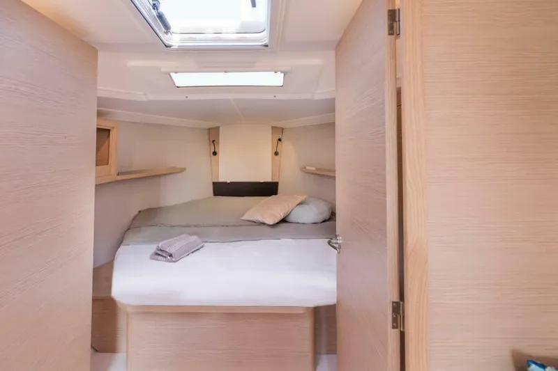 In Stock #108 Yacht Photos Pics Cozy cabin interior of 2025 Dufour 37 yacht with modern design and skylight.