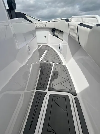  Yacht Photos Pics 2021 Streamline 34CC boat interior with sleek, modern design and cushioned seating.