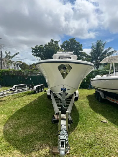  Yacht Photos Pics 2021 Streamline 34CC boat on a trailer, parked on grass.