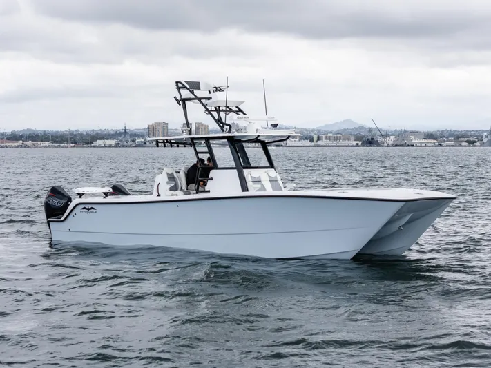 Tuna Colada Yacht Photos Pics 2020 Invincible 35 Catamaran on open water, showcasing sleek design and powerful performance.