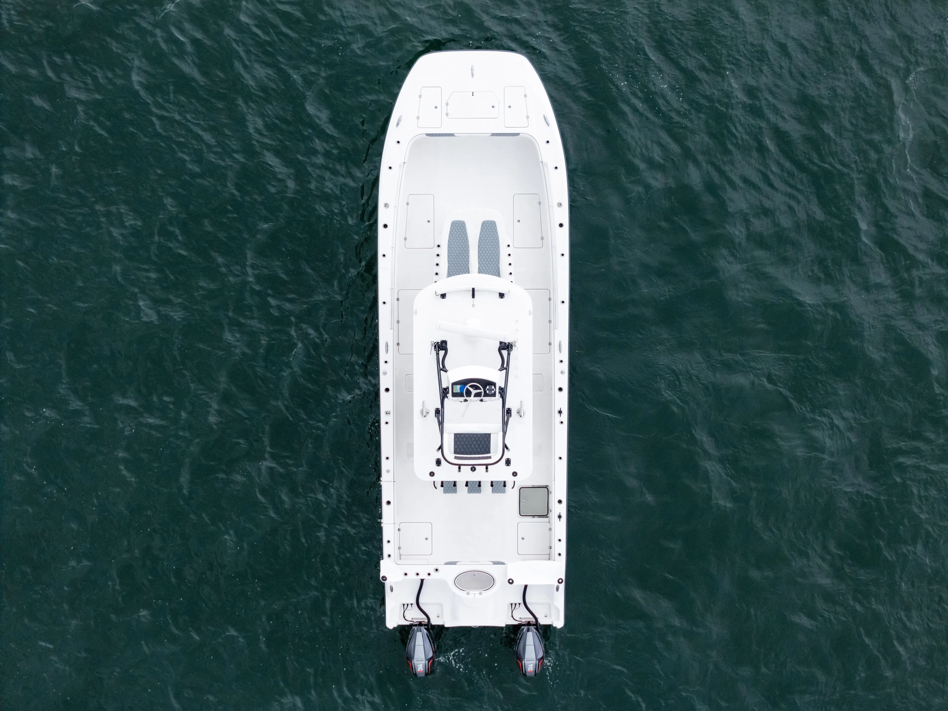 Tuna Colada Yacht Photos Pics Aerial view of 2020 Invincible 35 Catamaran on open water.