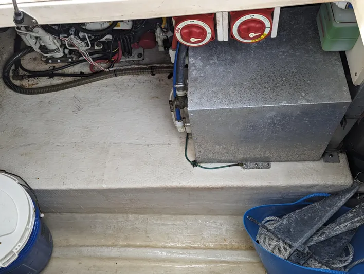 Boatanicals Yacht Photos Pics 2016 Stamas Aegean boat engine compartment with equipment and storage items.
