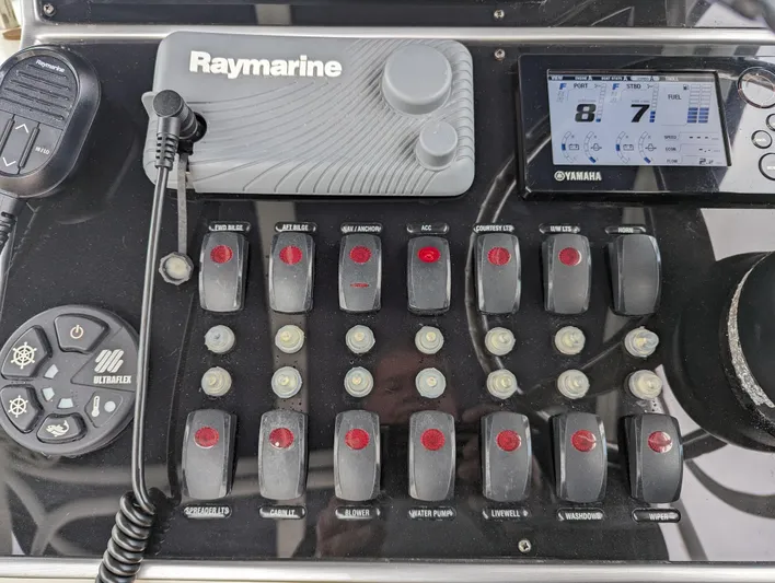 Boatanicals Yacht Photos Pics Control panel of a 2016 Stamas Aegean boat with Raymarine and Yamaha displays.