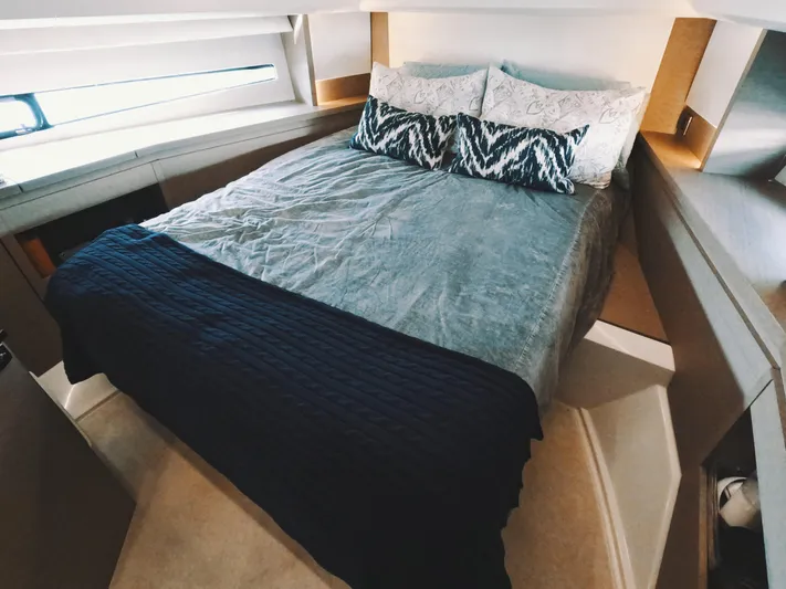  Yacht Photos Pics Luxurious bedroom interior of 2020 Prestige 460 yacht with cozy bedding.