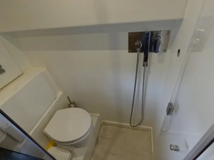 Yacht Photos Pics Compact bathroom in 2020 Prestige 460 yacht with shower and toilet.