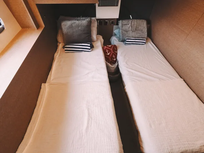  Yacht Photos Pics Twin beds in a 2020 Prestige 460 yacht cabin with cozy decor.
