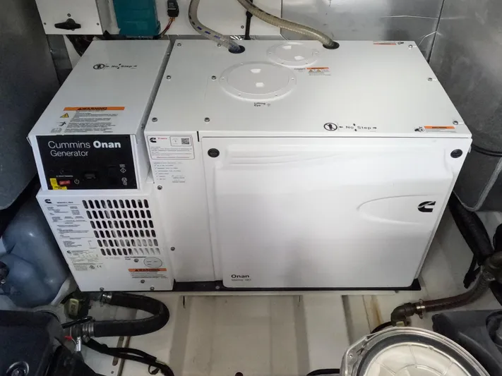  Yacht Photos Pics Cummins Onan generator in a 2020 Prestige 460 yacht engine room.