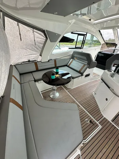 De-sea Yacht Photos Pics 2021 Beneteau GT 32 yacht interior with sleek seating and modern design.