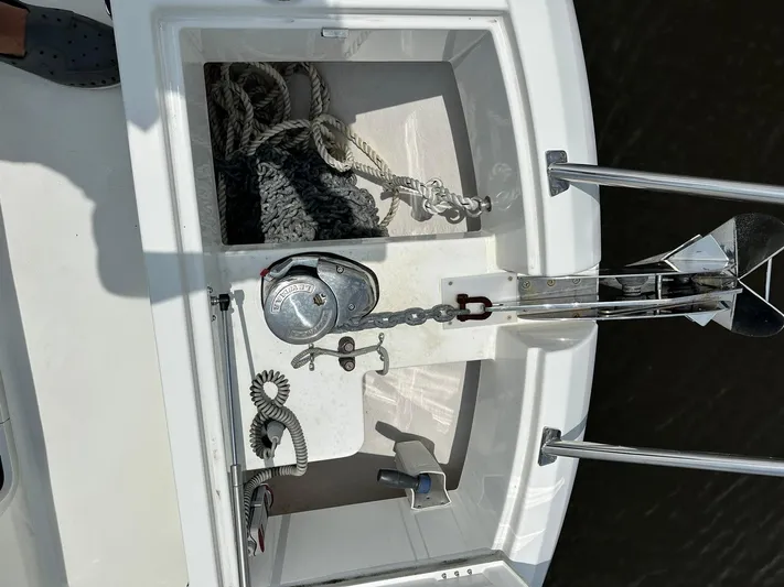 De-sea Yacht Photos Pics Anchor compartment of 2021 Beneteau GT 32 boat with ropes and chain.