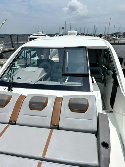 De-sea Yacht Photos Pics 2021 Beneteau GT 32 yacht with sleek design, docked at marina.