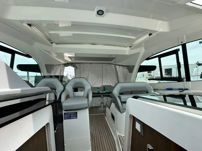 De-sea Yacht Photos Pics Interior of 2021 Beneteau GT 32 yacht, featuring modern seating and sleek design.