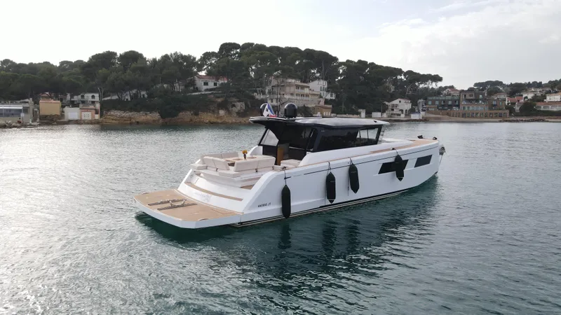 Kayenne Yacht Photos Pics 2023 Pardo Yachts GT 52 luxury yacht on serene water.