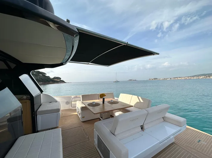 Kayenne Yacht Photos Pics Luxury 2023 Pardo Yachts GT 52 with elegant deck seating and ocean view.