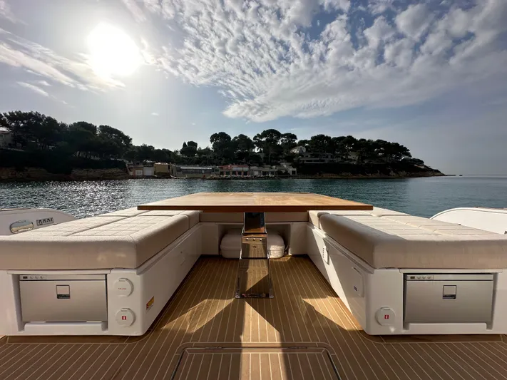 Kayenne Yacht Photos Pics Luxury 2023 Pardo Yachts GT 52 deck with scenic coastal view.