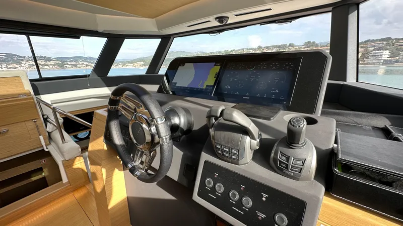 Kayenne Yacht Photos Pics Interior helm of 2023 Pardo Yachts GT 52 with advanced navigation controls.
