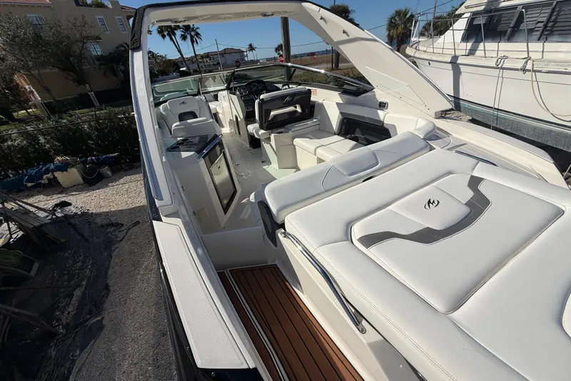  Yacht Photos Pics 2014 Monterey 328SS Super Sport boat with luxurious white interior and sleek design.
