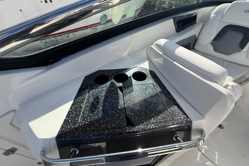  Yacht Photos Pics 2014 Monterey 328SS Super Sport boat interior with sleek seating and cup holders.