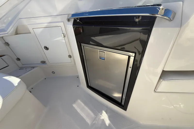  Yacht Photos Pics 2014 Monterey 328SS Super Sport boat interior with sleek stainless steel cabinetry.