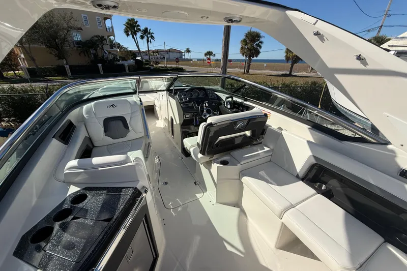  Yacht Photos Pics 2014 Monterey 328SS Super Sport boat interior with luxurious seating and modern dashboard.