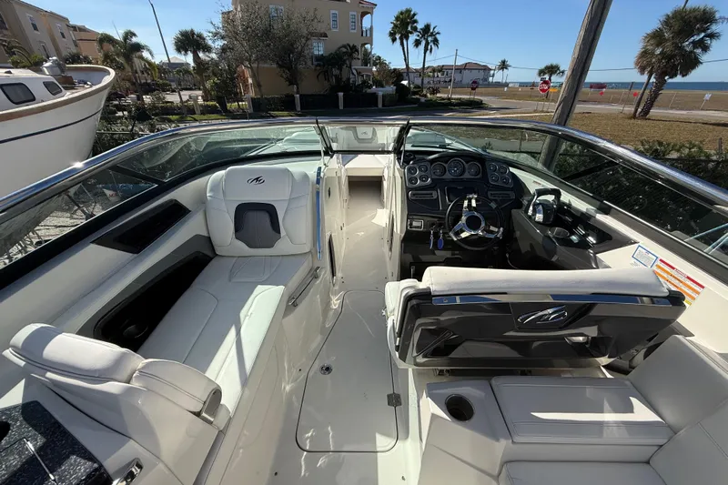  Yacht Photos Pics 2014 Monterey 328SS Super Sport boat interior with white seating and control panel.