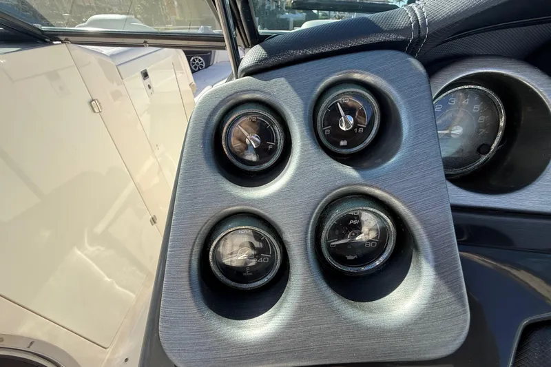  Yacht Photos Pics Dashboard gauges of a 2014 Monterey 328SS Super Sport boat.