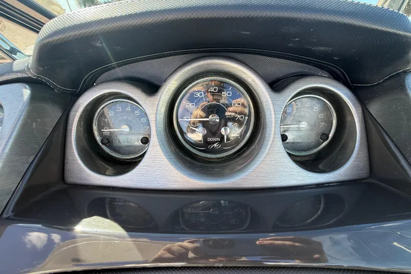  Yacht Photos Pics Dashboard of a 2014 Monterey 328SS Super Sport boat with speedometer and gauges.