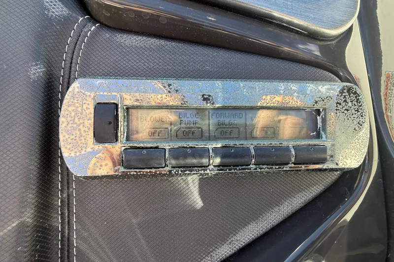  Yacht Photos Pics Control panel of a 2014 Monterey 328SS Super Sport boat with visible wear.