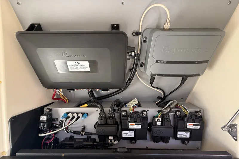  Yacht Photos Pics Electrical panel of a 2014 Monterey 328SS Super Sport boat with Medallion and Raymarine components.