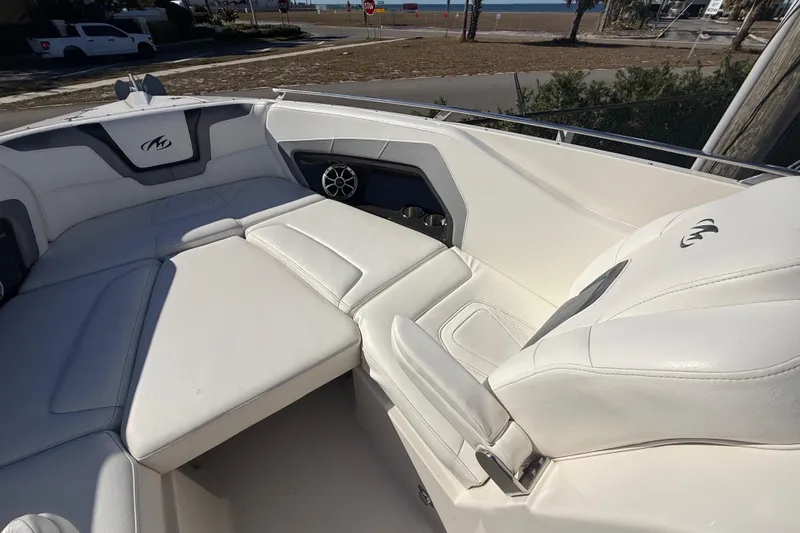  Yacht Photos Pics Luxurious interior of a 2014 Monterey 328SS Super Sport boat with white seating.
