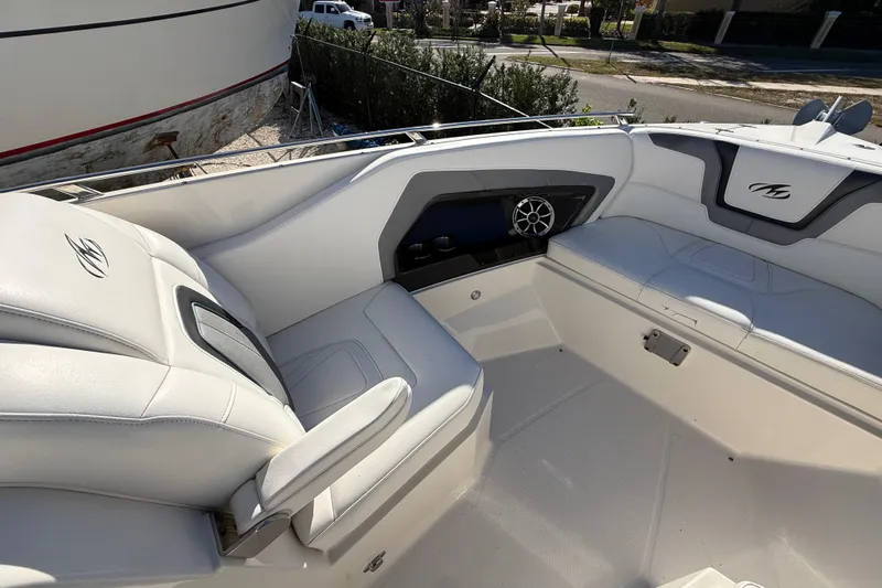 Yacht Photos Pics 2014 Monterey 328SS Super Sport boat interior with white seating and speaker system.