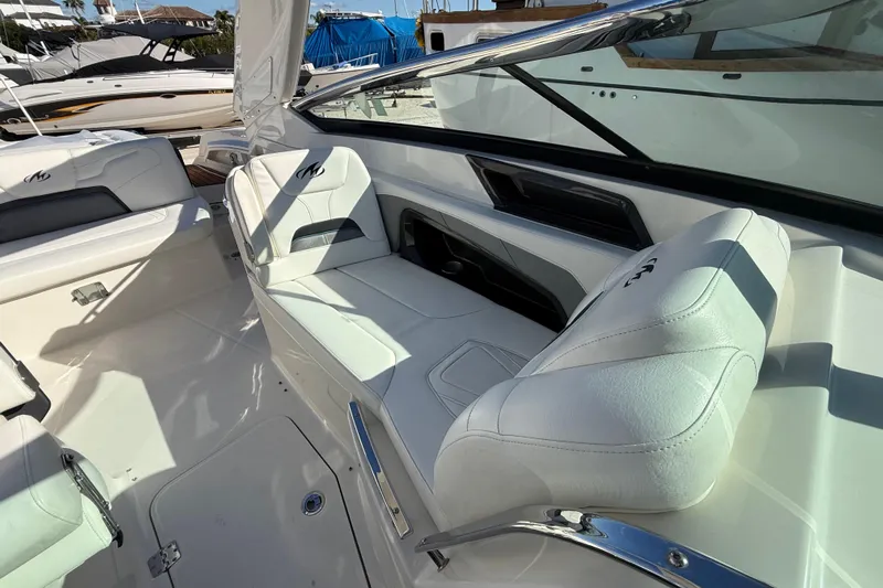  Yacht Photos Pics 2014 Monterey 328SS Super Sport boat interior with white leather seating.