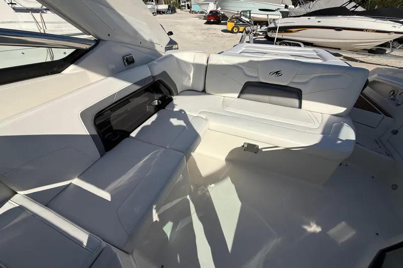  Yacht Photos Pics Interior of a 2014 Monterey 328SS Super Sport boat with white seating.
