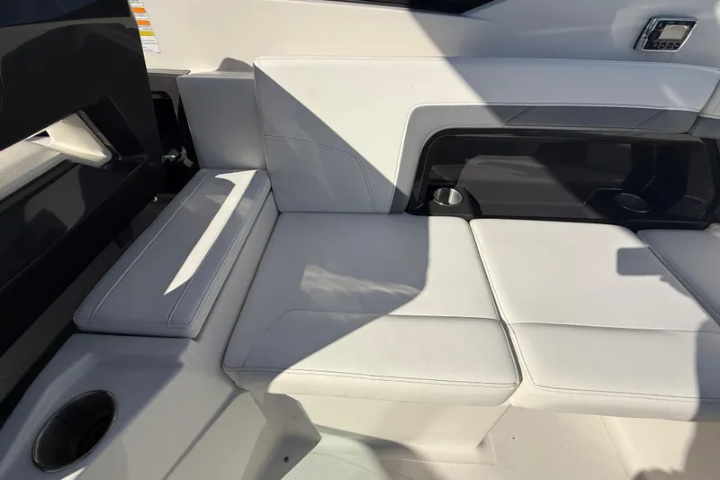  Yacht Photos Pics 2014 Monterey 328SS Super Sport boat interior with white seating and cup holders.